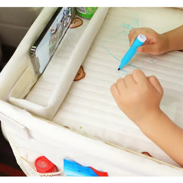 Portable kids travel tray with storage pockets for airplane and car travel